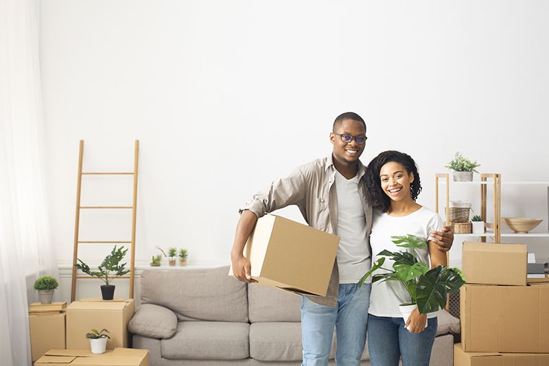 Young couple moving to a new apartment